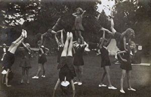 Images Dated 16th May 2017: Schoolgirls practising gymnastics