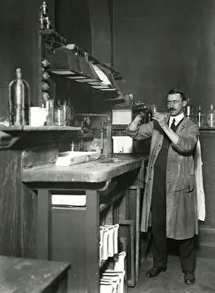 Pouring Collection: Scientist in Metropolitan Police laboratory