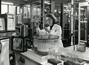 Images Dated 24th August 2018: SCIENTIST AND TEST TUBES