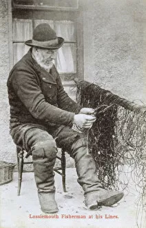 Fisherman Collection: Scotland - Lossiemouth Fisherman mending his lines