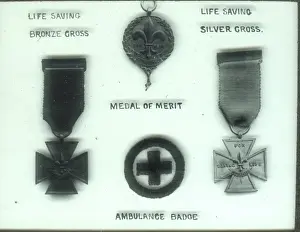 Four Scout badges and awards