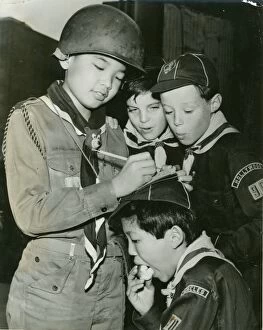 Scout Patrol Leader Willie Chun signing autographs