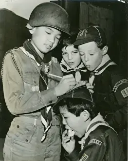Attends Prints: Scout Patrol Leader Willie Chun signing autographs