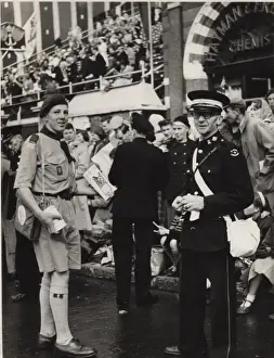 Scout selling Coronation programmes