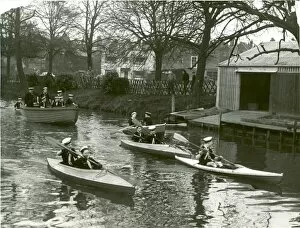 Scouts in canoes and boats