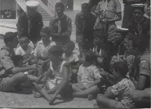 Scouts with earthquake victims in Patras, Greece
