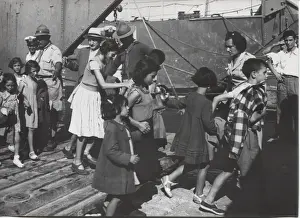 Scouts escorting earthquake victims, Greece