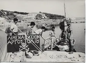 Earthquakes Prints: Scouts landing materials at Argostolion, Kefalonia, Greece
