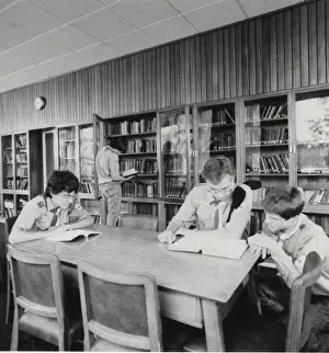 Scouts in library at Baden Powell House, London