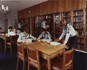 Scouts in library at Baden Powell House, London