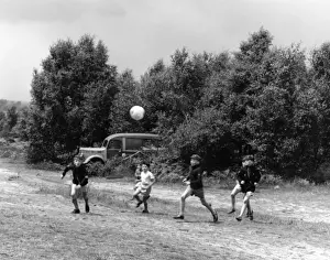Dusty Prints: Scouts Playing Football