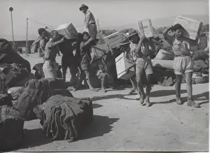 Distribution Prints: Scouts unloading supplies after earthquake, Greece