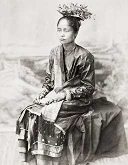 SE Asia, probably Malay peninsula, women in traditional dress