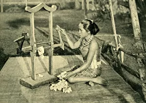 Sea Dayak woman making thread, Borneo, SE Asia