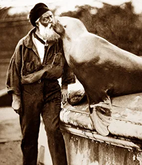 Sea lion and zoo keeper