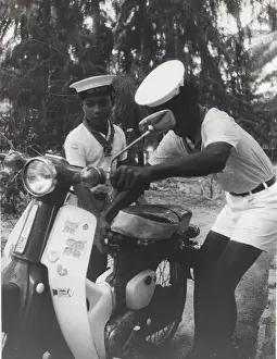 Sea scouts with moped, Gilbert Islands, Pacific