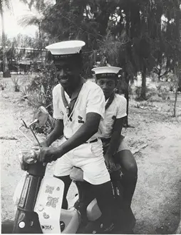 Sea scouts with moped, Gilbert Islands, Pacific