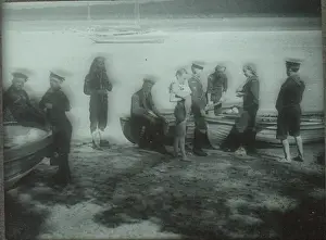 Sea Scouts pulling up boats from the water