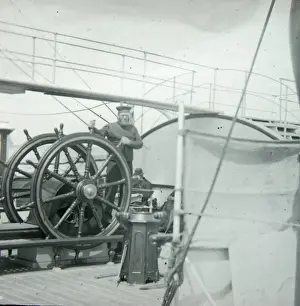 Walk Way Prints: Seaman at the wheel of a ship