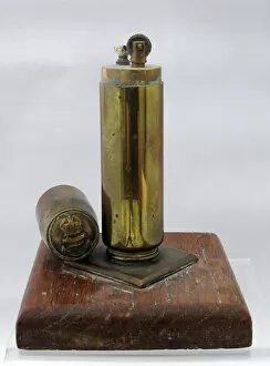 Images Dated 14th February 2012: Second World War Trench Art lighter on wooden plinth