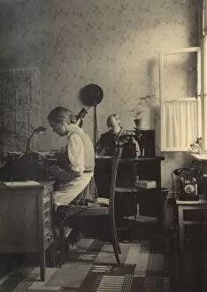 Typewriter Gallery: Secretary and soldier in an office, Braunschweig, Germany