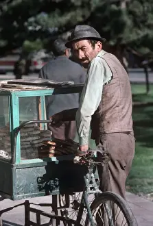 Vest Prints: Seller and cycle-powered mobile food stall, Fetiye, Turkey