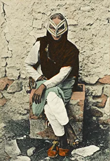 Cloak Gallery: Semi-veiled woman at Muscat, Oman