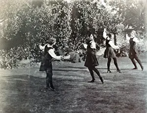 Seniors Prints: Four Seniors dancing in the garden