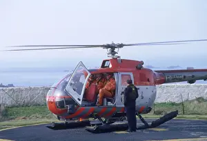 Besley Prints: Service Helicopter transporting water to Lighthouses