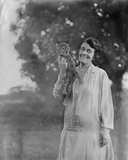 Settler with cheetah cub, Nakuru, East Africa