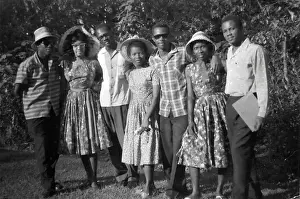 Sunglasses Prints: Seven black British Caribbean and African students having a
