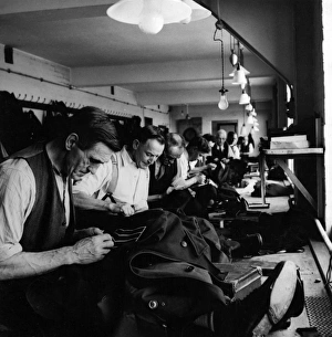 Images Dated 24th February 2011: Sewing and repairing Metropolitan Police uniform