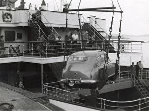 Ferries Gallery: Shipping a British car by ferry, Fishguard, South Wales. Date: 1950s