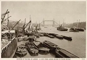 Shipping on the River Thames, London, view from London Bridge looking towards Tower