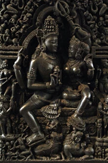Hinduism Collection: Shiva and Parvati sculpture. Orissa, India, 13th century AD