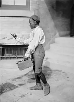 Shine Prints: Shoe shine boy looking for business in America