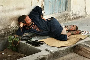 Tunisian Collection: Shoe shine man in a shady spot - Houmt Souk, Djerba, Tunisia