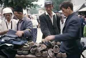 Images Dated 9th August 2012: Shoe stall in street market, Yugoslavia