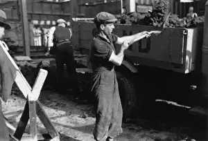 Shovelling rubble onto a lorry