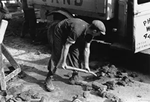 Bends Prints: Shovelling rubble onto a lorry