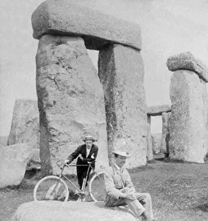 Pre History Prints: Two sightseers at Stonehenge, Wiltshire