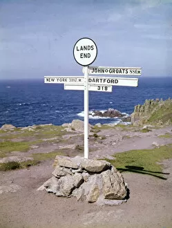 Cliff Collection: Signpost at Lands End, Cornwall