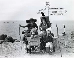 1984 Gallery: Signpost at Lands End, Cornwall, with charity walkers