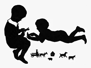 Silhouette of two children with cutout toys