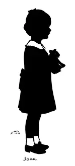 Silhouette of a girl with a toy animal