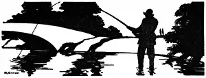 Silhouette of a man fishing in a river