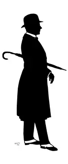 Silhouette of man with rolled umbrella