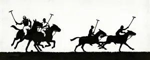 Silhouette of four polo players