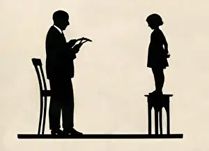 Silhouette portrait of H. L. Oakley cutting a silhouette por