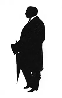 Silhouette of a soldier in ceremonial uniform